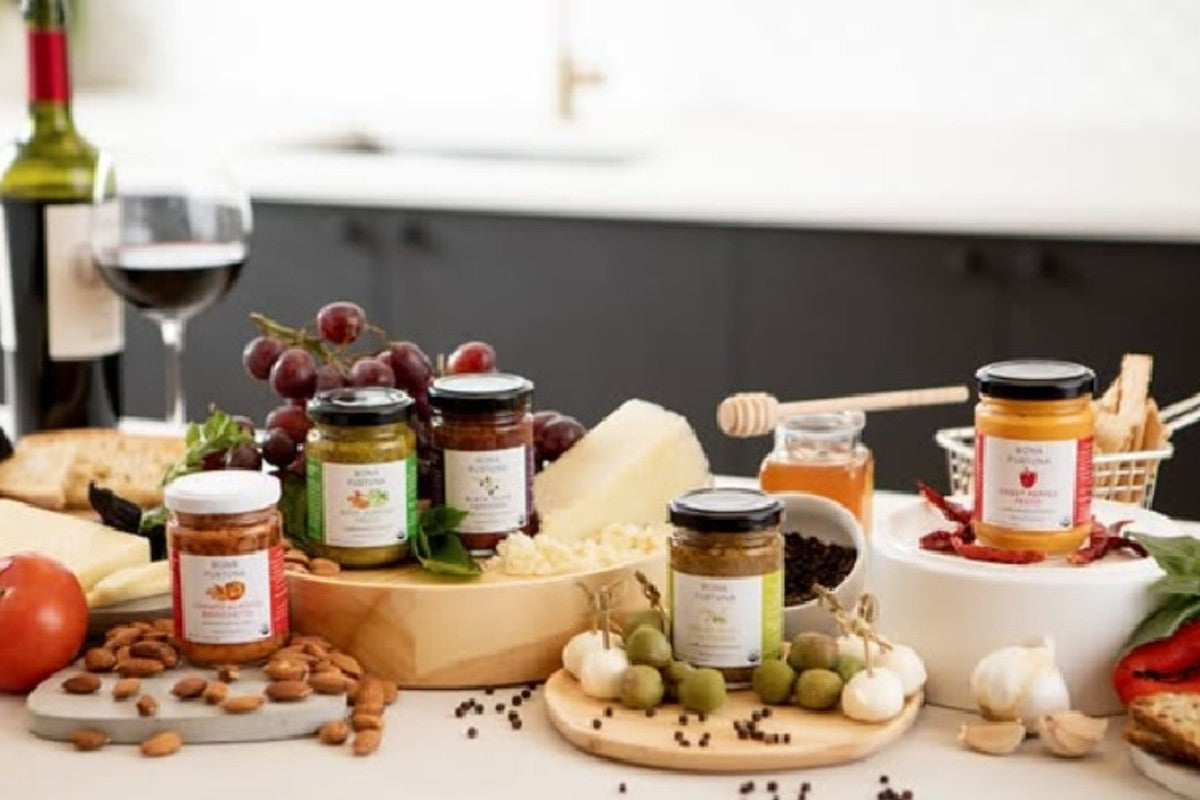 A selection of European gourmet foods for a charcuterie tray at The Spice & Tea Shoppe.