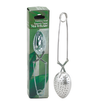 Stainless steel snap spoon tea infuser with green box on white background. The Spice & Tea Shoppe