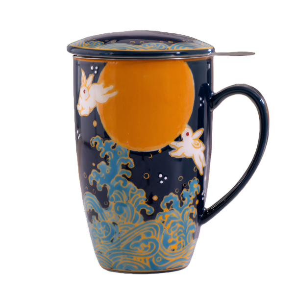 Decorative mug with a lid and handle, featuring a rabbit and moon design on a white background. The Spice & Tea Shoppe