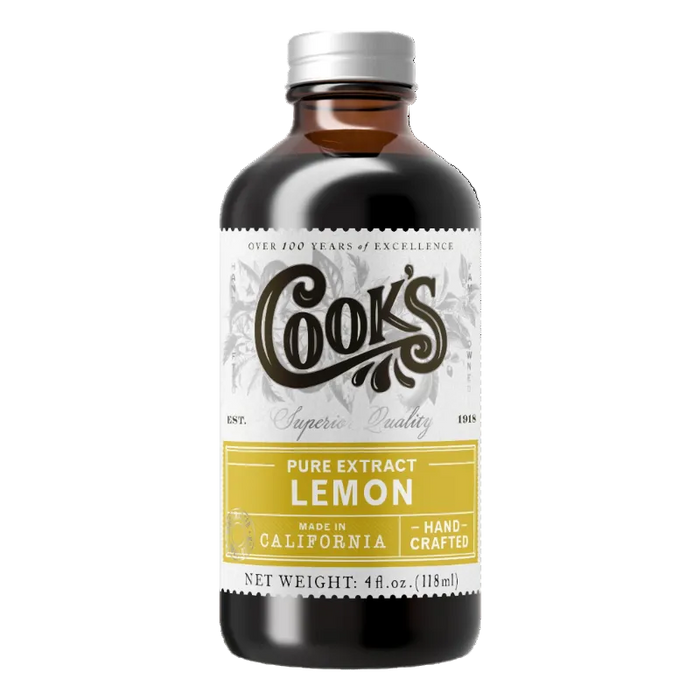 Bottle of Cook's lemon extract on a white background