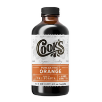 Bottle of Cook's Pure Extract Orange on a white background