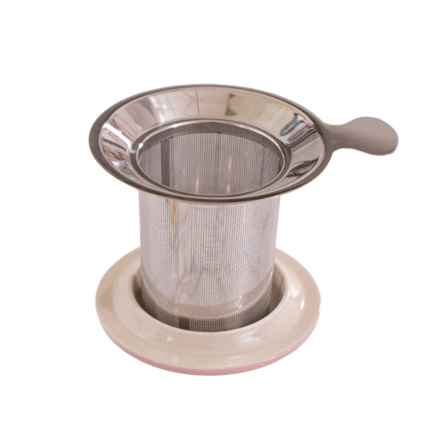 Metal tea infuser on a white background. The Spice & Tea Shoppe