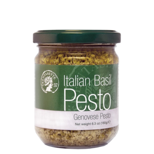 Jar of Italian Basil Pesto with green label on a white background. The Spice & Tea Shoppe