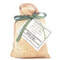 Herbs de Provence bread mix in a hessian bag with a green ribbon on a white background