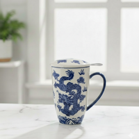 White mug with blue dragon design on a white surface