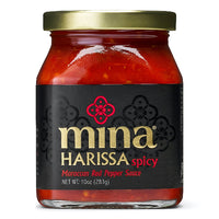 Jar of Mina Harissa spicy Moroccan Red Pepper Sauce on a white background. The Spice & Tea Shoppe